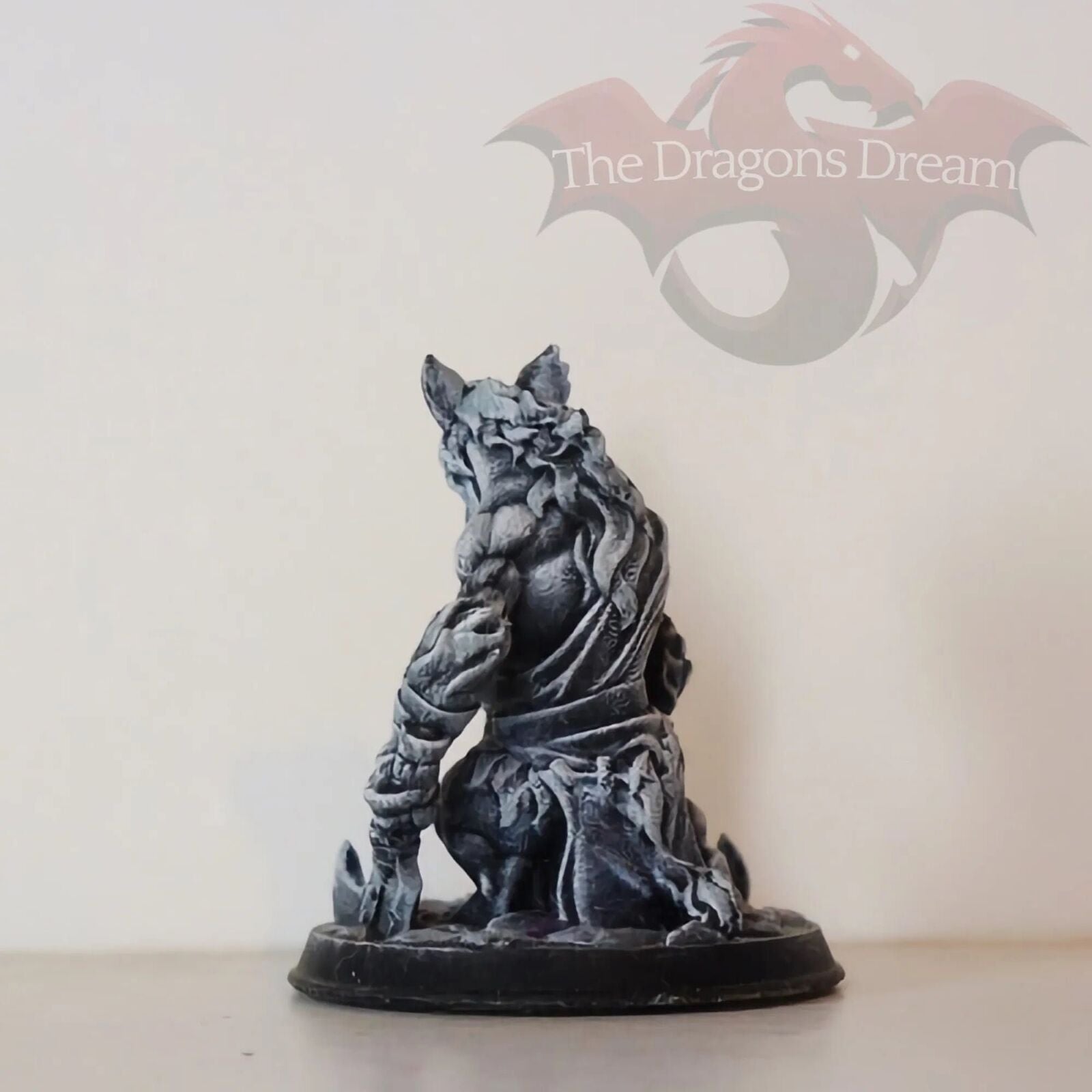 Hyena man with an axe