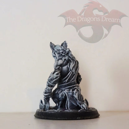 Hyena man with an axe